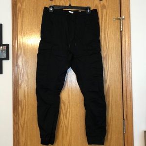H&M cargo pants. Size small, black. Stretch waistband, pockets.